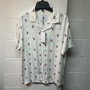 Denim and Flower Christmas Shirt.
Santa lifeguard, surfboard